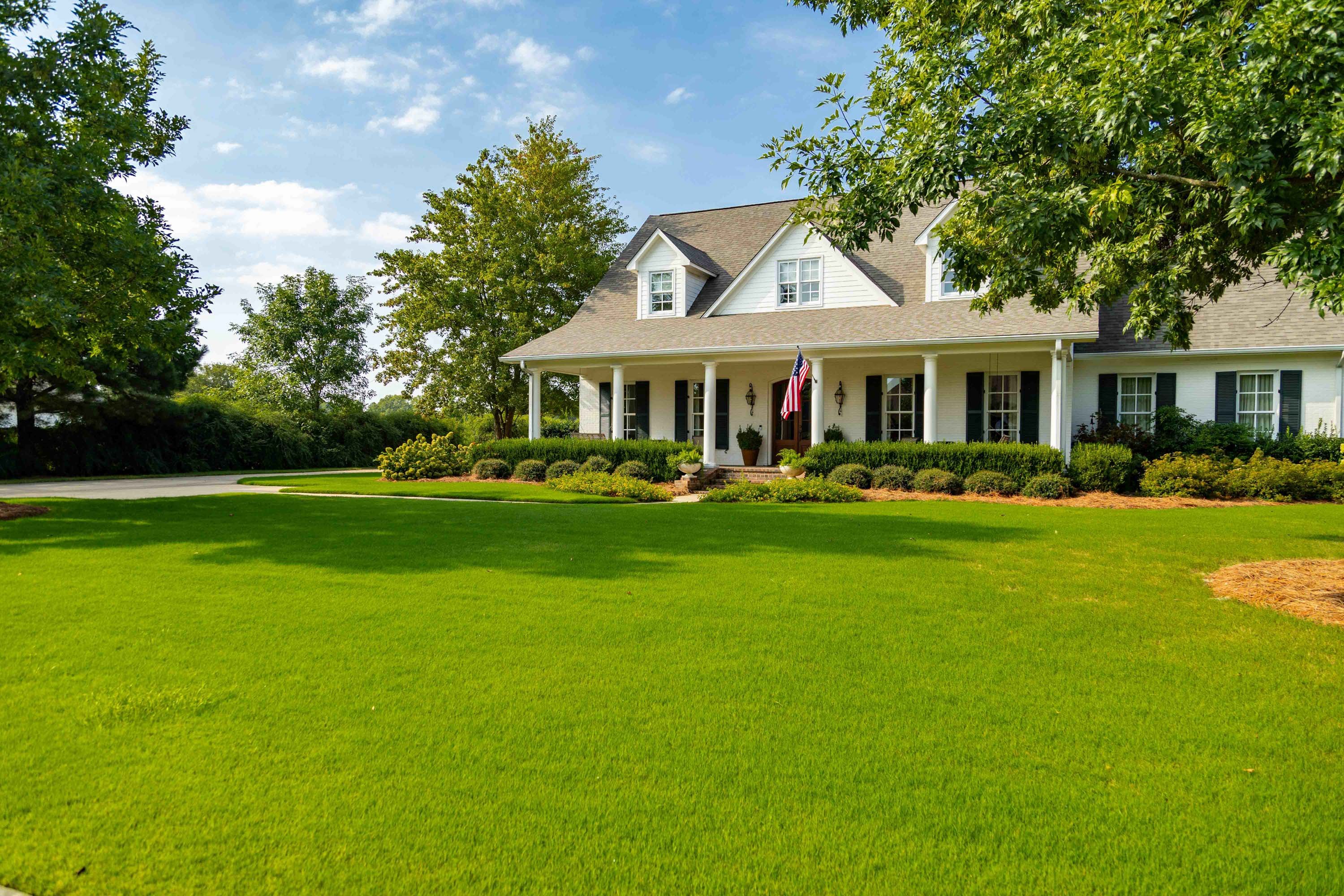 a nice lawn in front of a mississippi home