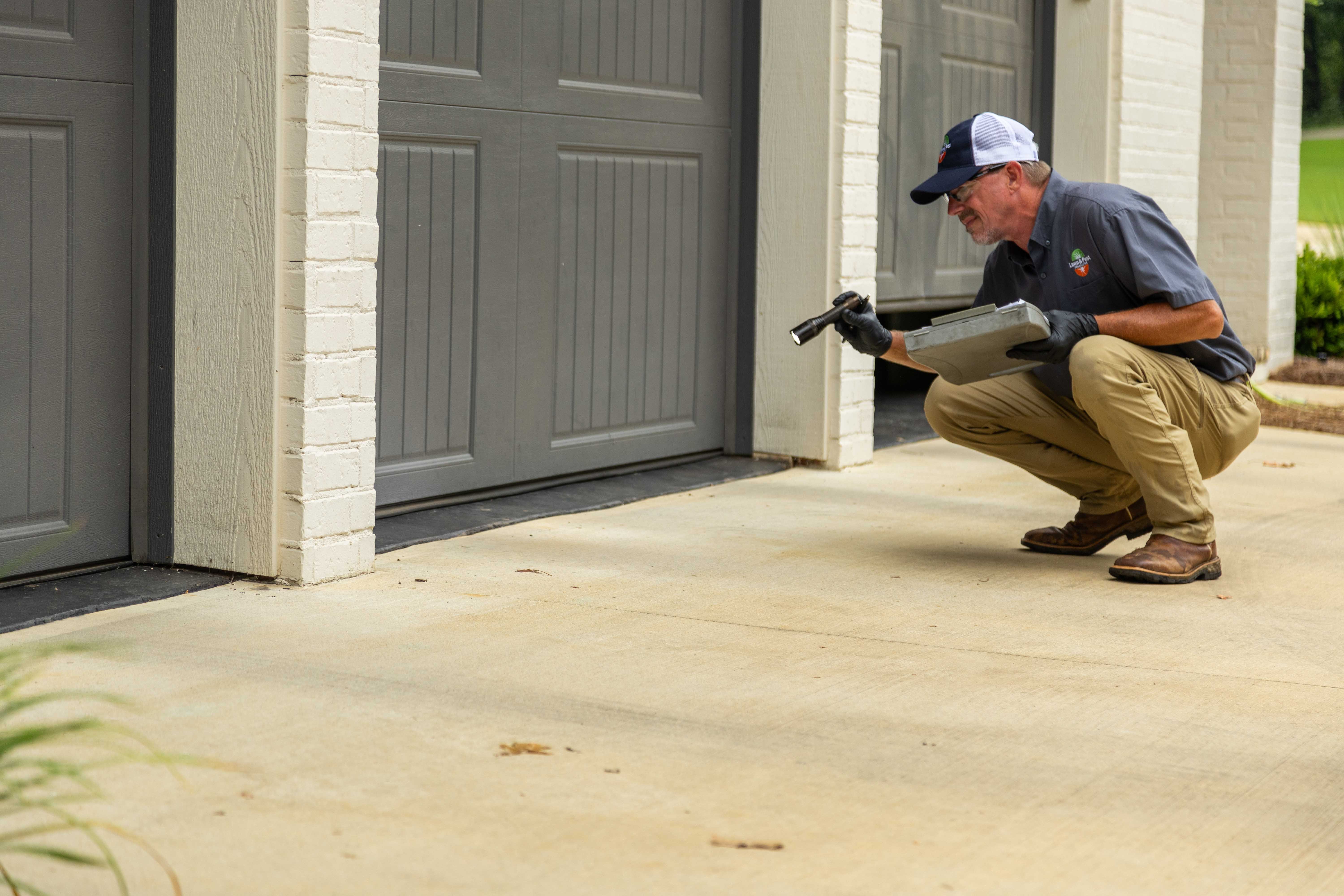 pest control tech crew garage inspection 10