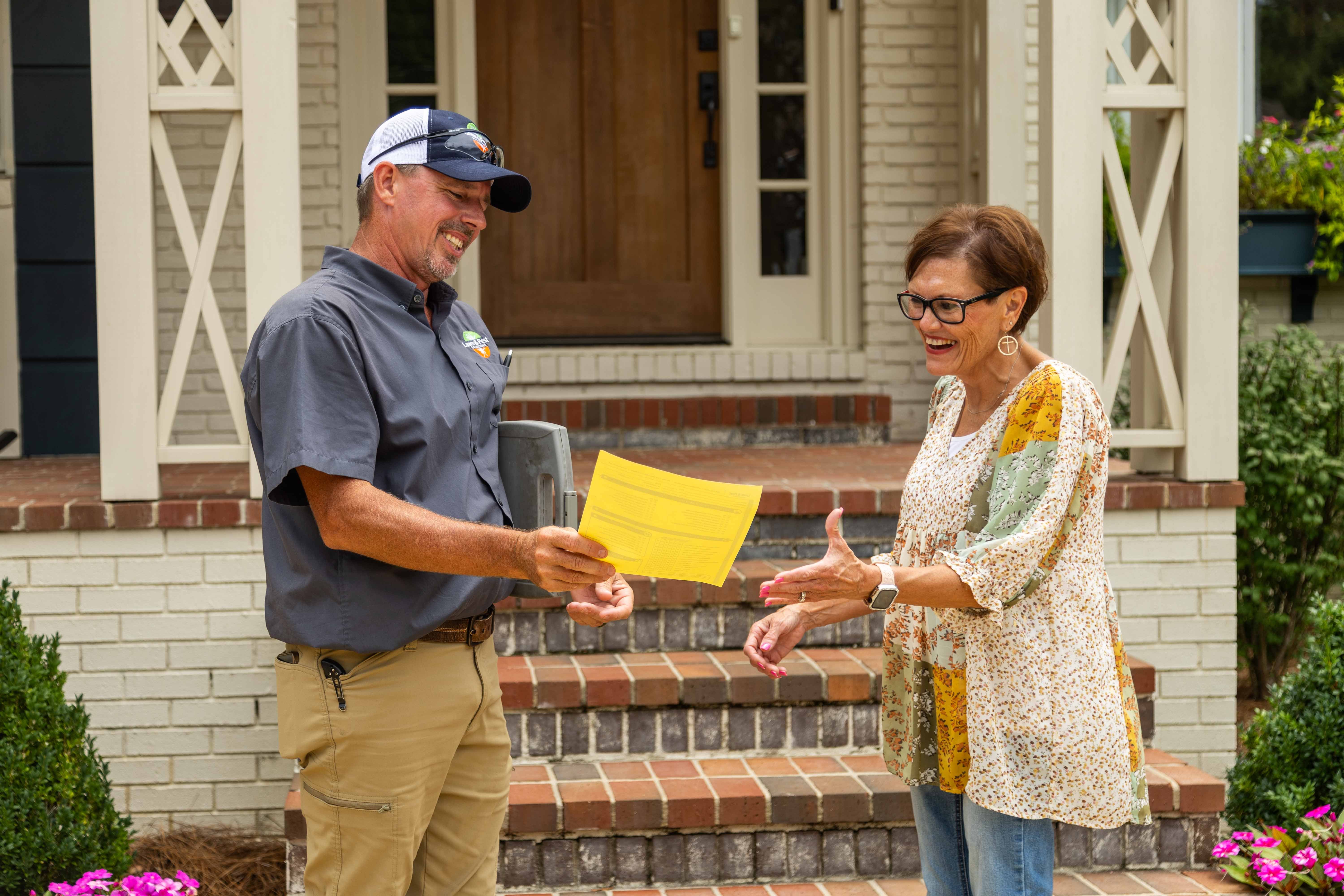 pest control technician client meeting to review service plan