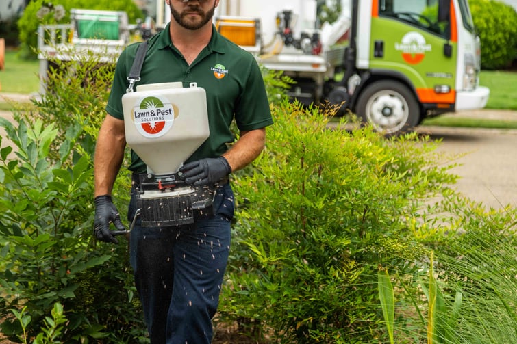 plant health care truck technician crew granular fertilizer grinder spreader beds shrubs action 2